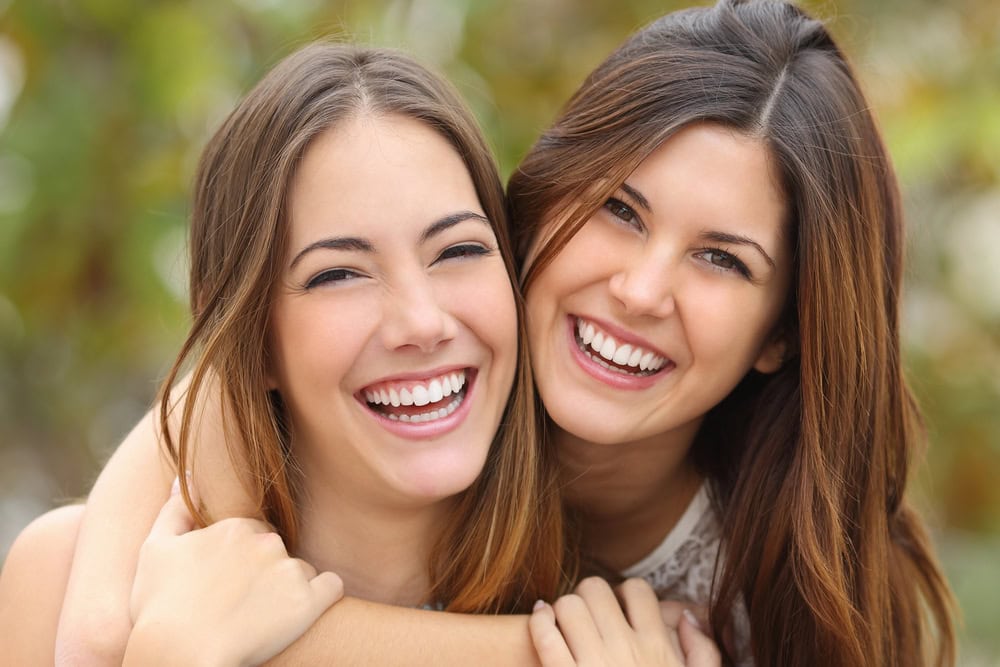 fixed partial dentures vs implants